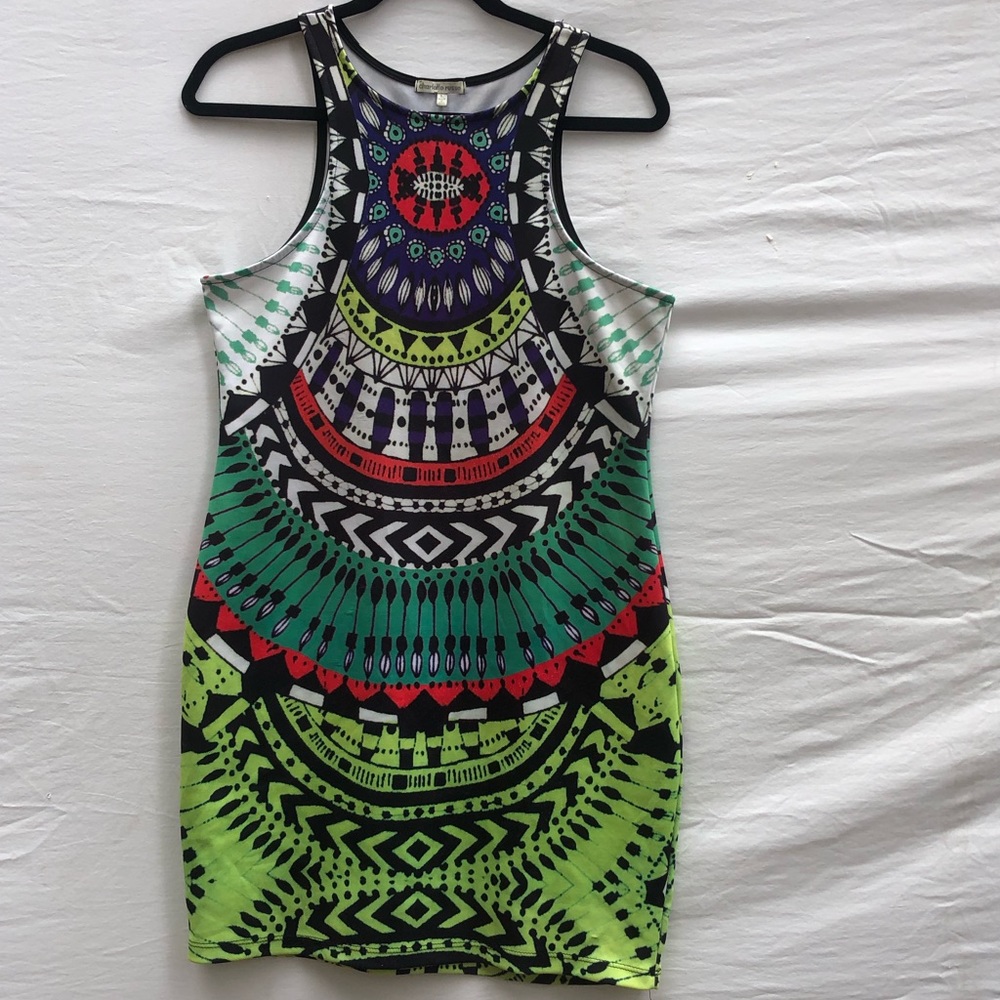 Exotic, patterned, body con dress.